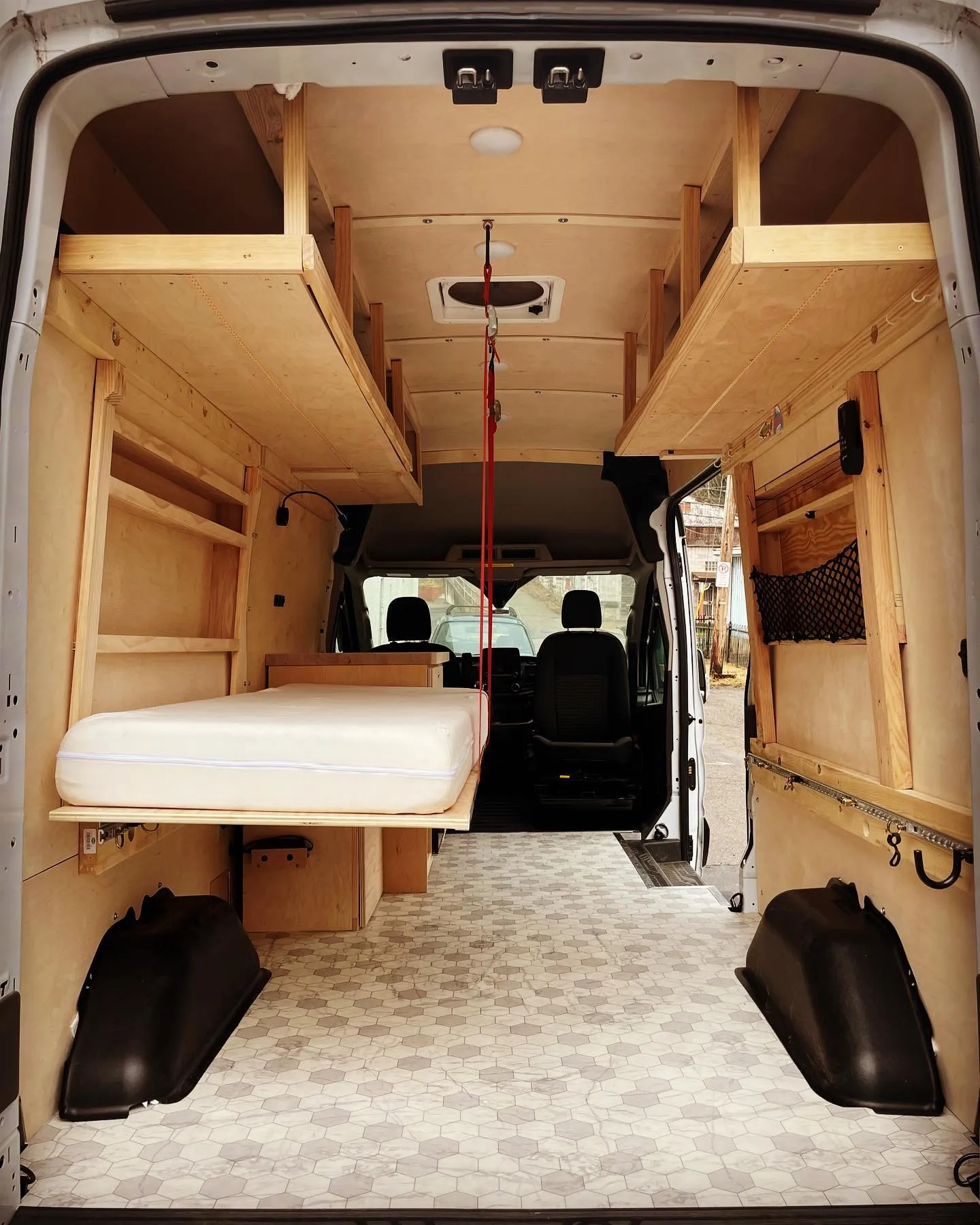This kick as client @abarensfeld came with a partial DIY build to get some lighting, paneling, flooring, and kitchenette.